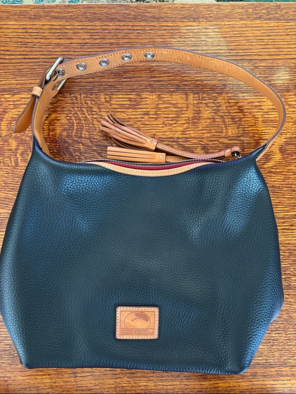 Dooney & Bourke Black Pebbled Leather Hobo with Tan Strap